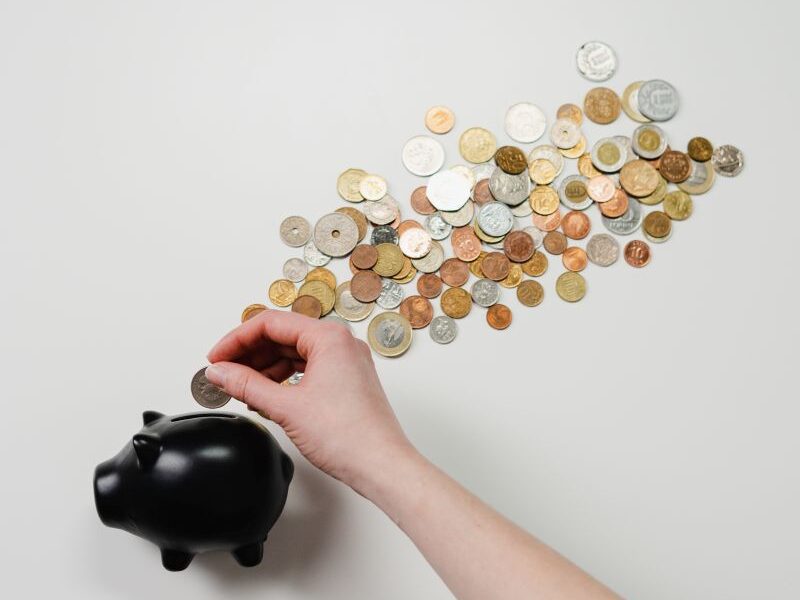 Piggy bank with coins