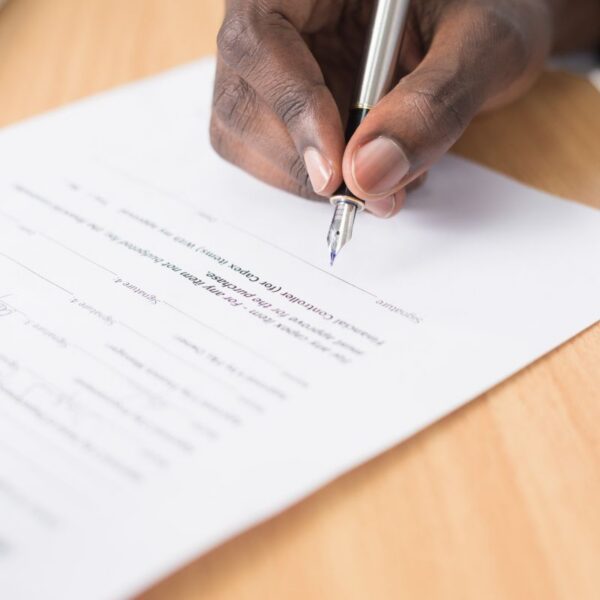 A person signing a document